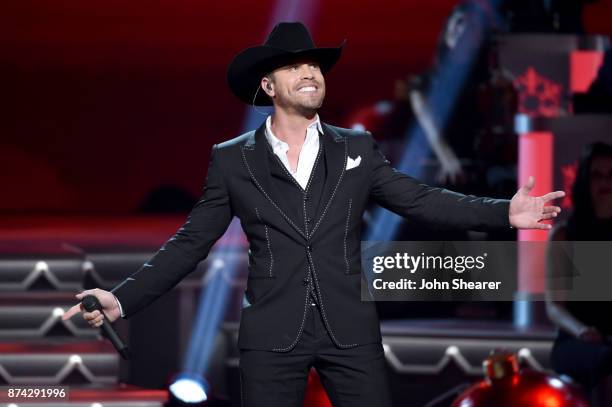 Dustin Lynch performs onstage for CMA 2017 Country Christmas at The Grand Ole Opry on November 14, 2017 in Nashville, Tennessee.