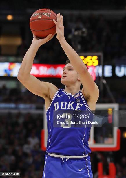 Grayson Allen of the Duke Blue Devils puts up a shot on his way to a game-high 37 points against the Michigan State Spartans during the State Farm...