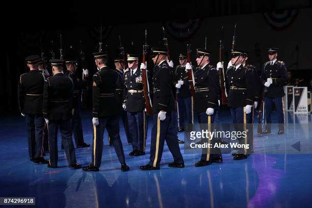 Members of the U.S. Army Drill Team perform during a special Twilight Tattoo performance November 14, 2017 at Fort Myer in Arlington, Virginia. U.S....