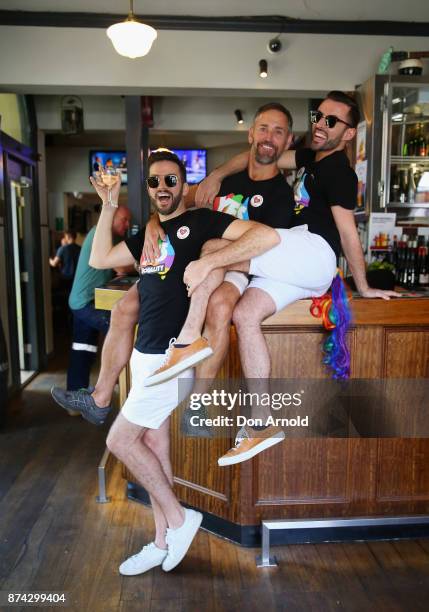 Jonathon Mavin, Brad Estrich and Dean Oberos celebrate the result announcement at the Lord Roberts Hotel in Darlinghurst on November 15, 2017 in...