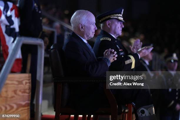 Army Chief of Staff Gen. Mark A. Milley and Sen. John McCain watch a special Twilight Tattoo performance November 14, 2017 at Fort Myer in Arlington,...