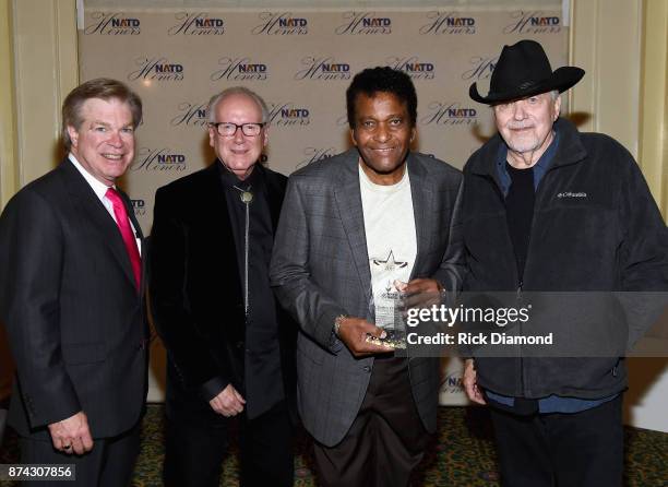 President Steve Tolman , Robert K. Oermann, honoree Charley Pride, and Bobby Bare attend the 2017 NATD Honors Gala at Hermitage Hotel on November 14,...