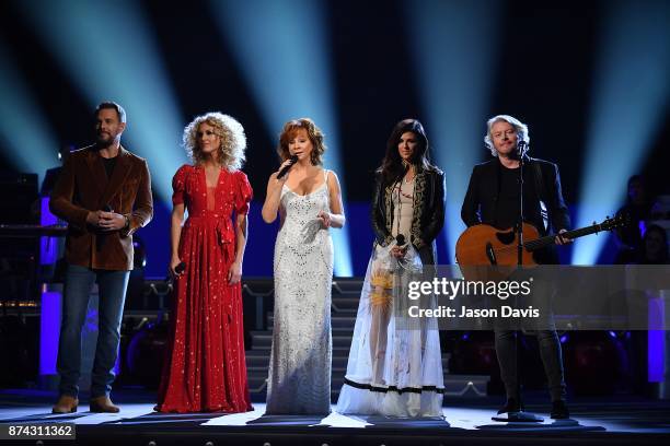 Recording Artists Jimi Westbrook, Kimberly Schlapman, Karen Fairchild and Phillip Sweet of Little Big Town along with Reba McEntire performs on stage...