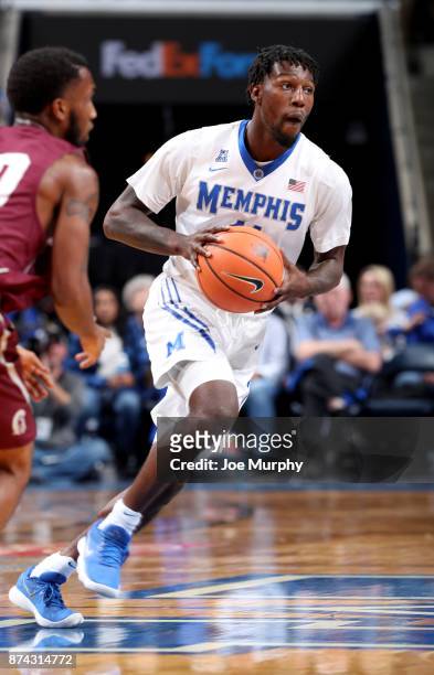 Malik Rhodes of the Memphis Tigers looks to pass against the Little Rock Trojans on November 14, 2017 at FedExForum in Memphis, Tennessee. Memphis...