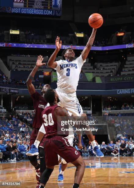 Jeremiah Martin of the Memphis Tigers grabs a rebound against Anthony Black of the Little Rock Trojans on November 14, 2017 at FedExForum in Memphis,...