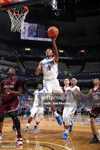 Jamal Johnson of the Memphis Tigers drives to the basket for a layup against the Little Rock Trojans on November 14, 2017 at FedExForum in Memphis,...