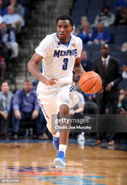 Jeremiah Martin of the Memphis Tigers dribbles the ball up court against the Little Rock Trojans on November 14, 2017 at FedExForum in Memphis,...