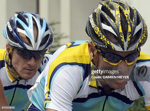 Lance Armstrong pedals with his teammate and compatriot Levi Leipheimer during the eighth stage of 92nd Giro of Italy between Morbegno and Bergamo on...