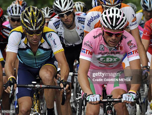 Lance Armstrong pedals with pink jersey Italy's Danilo Di Luca during the eight stage of 92nd Giro of Italy between Morbegno and Bergamo on May 16,...