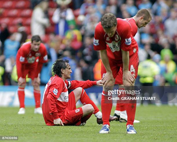 Middlesbrough's Turkish striker Tuncay Sanli and team-mates at the final whistle of the English Premier League football match between Middlesbrough...