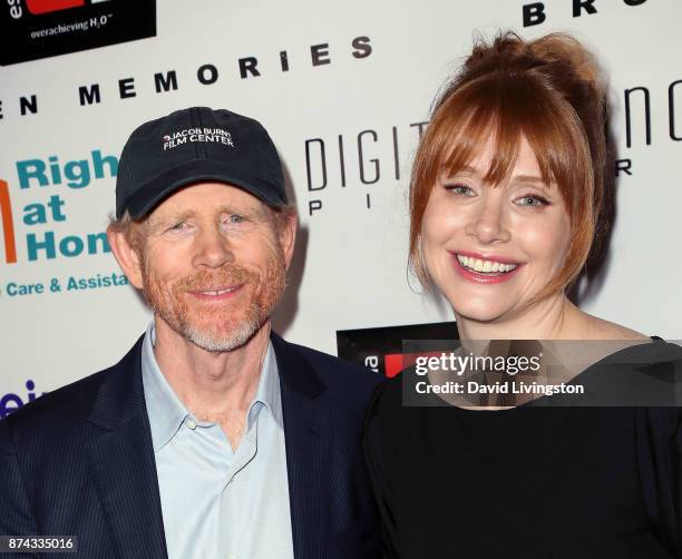 Director Ron Howard and daughter actress Bryce Dallas Howard attend a benefit screening of Digital Jungle Pictures' "Broken Memories" at the Writers...