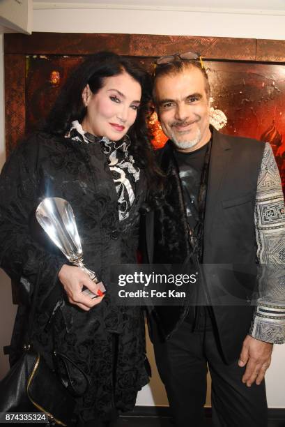 La Femme dans Le Siecle' awarded Lamia Khashoggi poses with Chayan Khoi during 'La Femme dans Le Siecle' Exhibition and Award Ceremony Cocktail at...