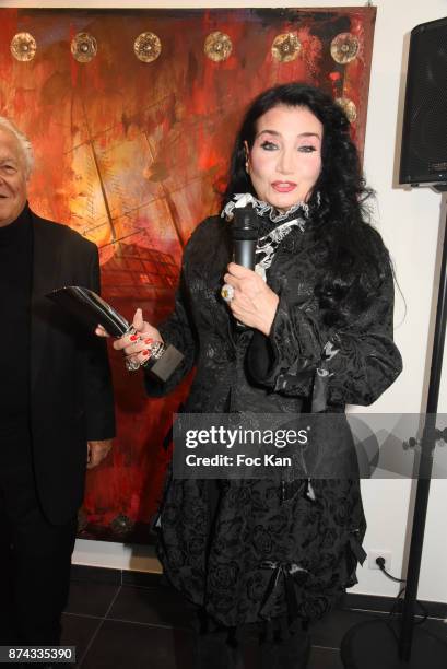 La Femme dans Le Siecle' awarded Lamia Khashoggi poses with her prize during 'La Femme dans Le Siecle' Exhibition and Award Ceremony Cocktail at...