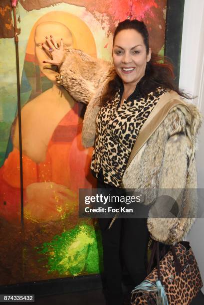 Hermine de Clermont Tonnerre poses with a work by Chayan Khoi 'La Femme dans Le Siecle' Exhibition and Award Ceremony Cocktail at Galerie FRM on...