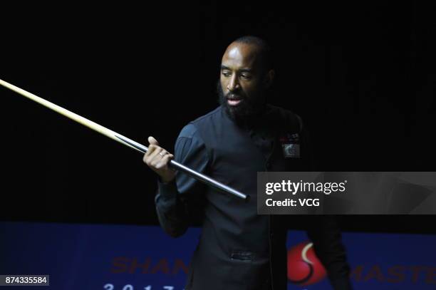 Rory McLeod of England reacts during the first round match against Stephen Maguire of Scotland on day two of 2017 Shanghai Masters at Shanghai Grand...