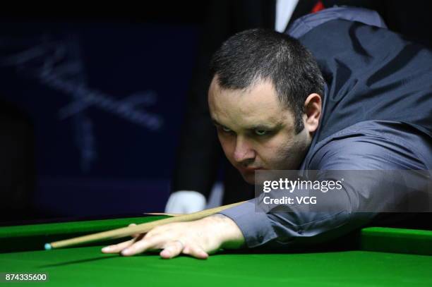 Stephen Maguire of Scotland plays a shot during the first round match against Rory McLeod of England on day two of 2017 Shanghai Masters at Shanghai...