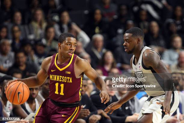 Minnesota Golden Gophers guard Isaiah Washington and Providence Friars guard Maliek White during a college basketball game between Minnesota Golden...