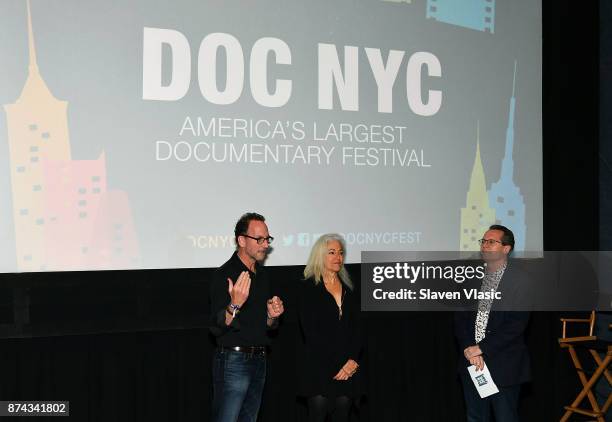 Producer David Heilbroner, director Kate Davis and Artistic director of documentary festival DOC NYC Thom Powers speak on stage at DOC NYC Premiere...