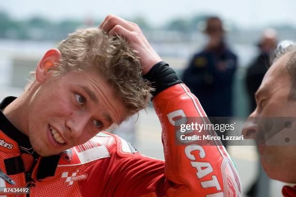 Casey Stoner of Australia and Ducati Malboro Team thinks after the third place after the qualifying practice of MotoGP of France on May 16, 2009 in...