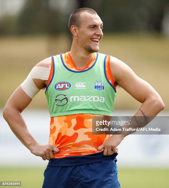 Braydon Preuss of the Kangaroos looks on during the North Melbourne Kangaroos training session at Arden St on November 15, 2017 in Melbourne,...