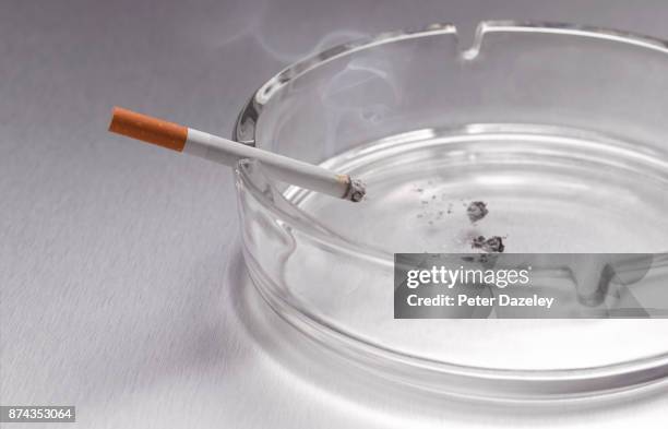 smoking lung cancer emphysema - ashtray stock pictures, royalty-free photos & images