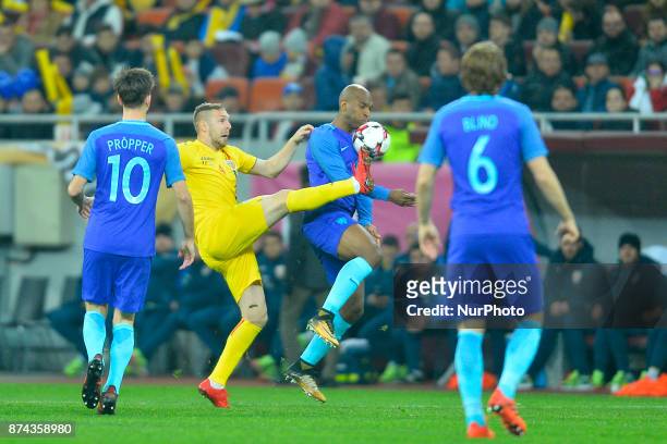 Cosmin Moti vies Ryan during International Friendly match between Romania and Netherlands at National Arena Stadium in Bucharest, Romania, on 14...