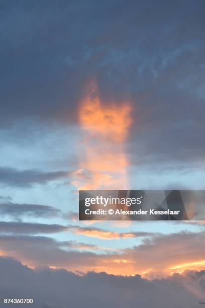 clouds at sunset - alexander kesselaar stock pictures, royalty-free photos & images