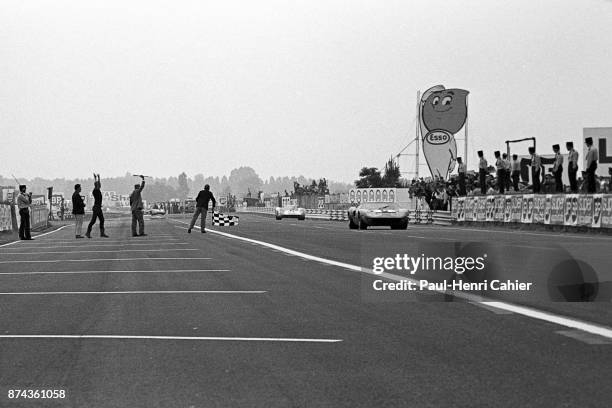 Jacky Ickx, Hans Herrmann, 24 Hours of Le Mans, Le Mans, 15 June 1969. Jacky Ickx winning the 1969 24 Hours of Le Mans ahead of Hans Herrmann's...