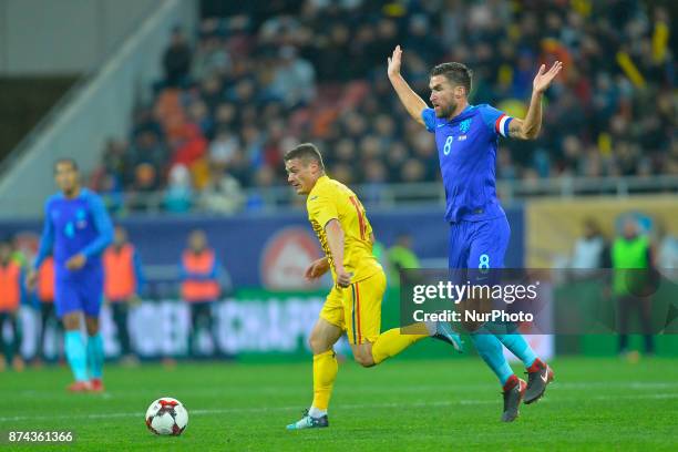 Gabriel Torje v Kevin Strootman during International Friendly match between Romania and Netherlands at National Arena Stadium in Bucharest, Romania,...