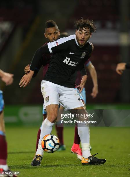 Matt Crooks of Northampton Town in action during the Emirates FA Cup First Round Replay match between Scunthorpe United and Northampton Town at...