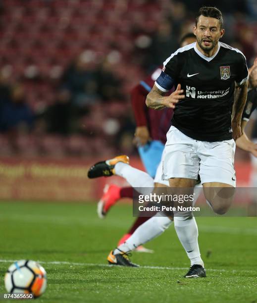 Marc Richards of Northampton Town in action during the Emirates FA Cup First Round Replay match between Scunthorpe United and Northampton Town at...