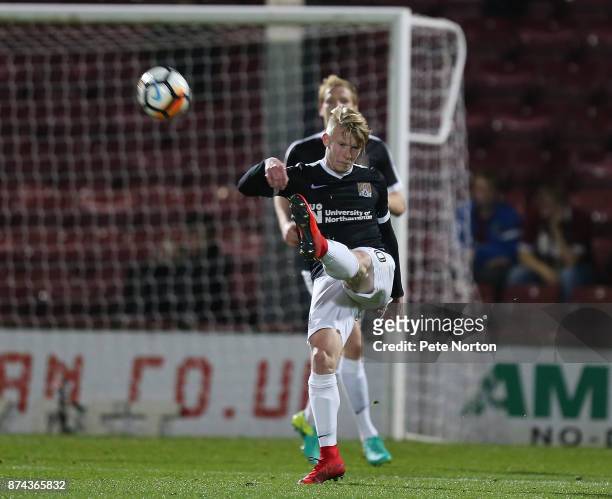 George Smith of Northampton Town in action during the Emirates FA Cup First Round Replay match between Scunthorpe United and Northampton Town at...