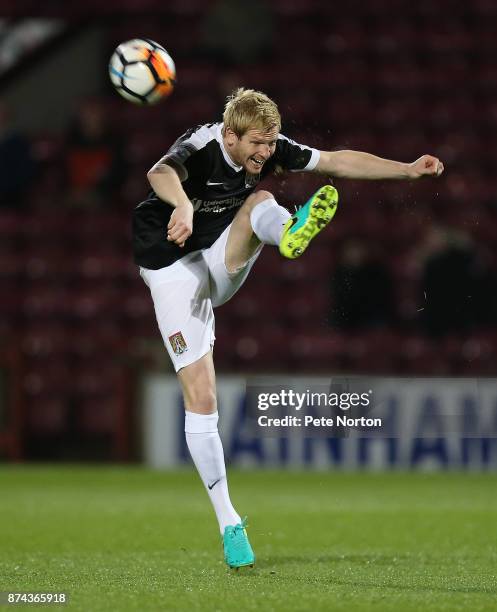 Ryan McGivern of Northampton Town in action during the Emirates FA Cup First Round Replay match between Scunthorpe United and Northampton Town at...