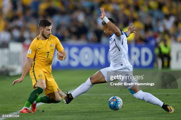 Mathew Leckie of Australia is tackled by Emilio Izaguirre of Honduras during the 2018 FIFA World Cup Qualifiers Leg 2 match between the Australian...