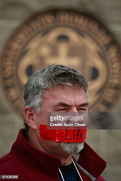Pro-life protestor Rob Yarbrough from Phoenix, Arizona demonstrates outside campus of Notre Dame University on May 16, 2009 in South Bend, Indiana....