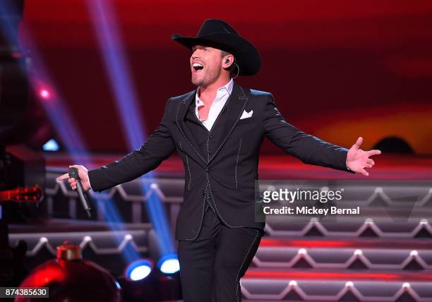 Recording artist Dustin Lynch performs during CMA 2017 Country Christmas at The Grand Ole Opry on November 14, 2017 in Nashville, Tennessee.