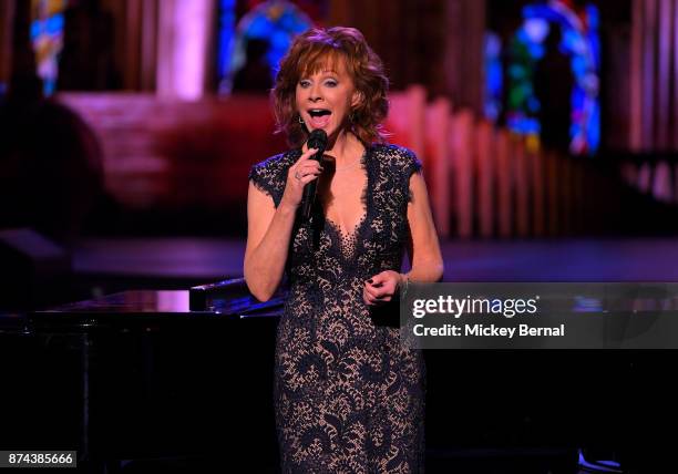 Recording artist Reba McEntire performs during CMA 2017 Country Christmas at The Grand Ole Opry on November 14, 2017 in Nashville, Tennessee.