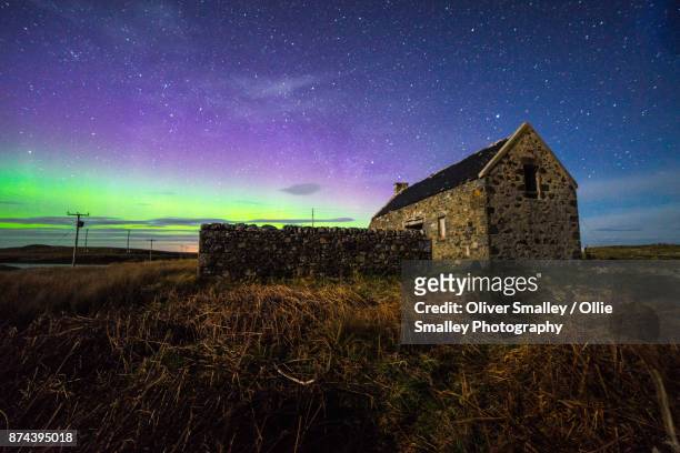 hebridean aurora - north uist, outer hebrides, scotland. - western isles stock pictures, royalty-free photos & images