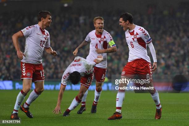 Andreas Christensen of Denmark celebrates with team mates Andreas Bjelland, Thomas Delaney and Simon Kjaer after scoring during the FIFA 2018 World...