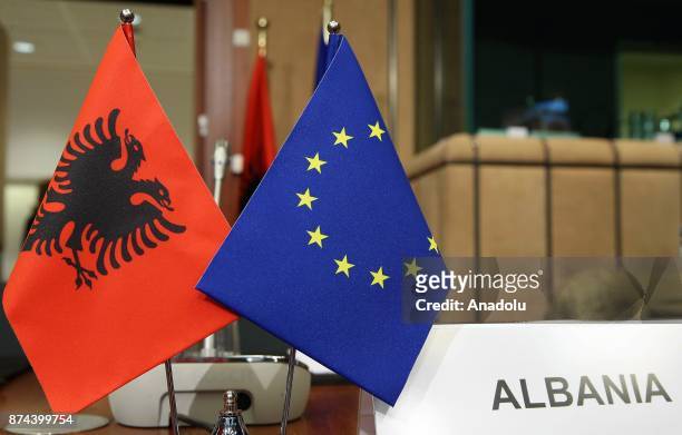 Albanian National Flag and European Union flag are seen as High Representative of the European Union for Foreign Affairs and Security Policy and...