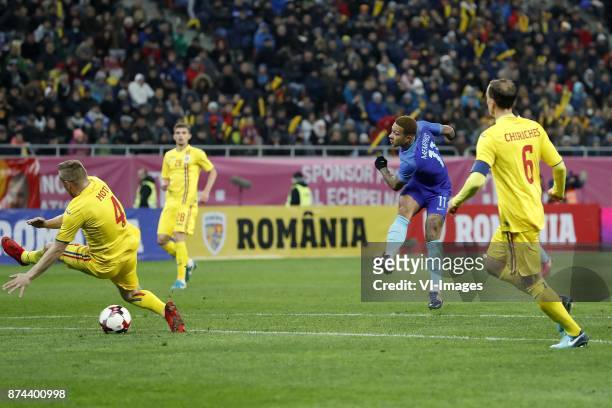Cosmin Moti of Romania, Florin Tanase of Romania, Memphis Depay of Holland, Vlad Chiriches of Romania during the friendly match between Romania and...