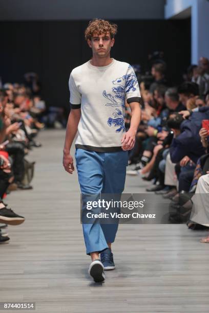 Model walks the runway during the Pineda Covalin show at Mercedes Benz Fashion Week Mexico Spring/Summer 2018 at Altto San Angel on November 14, 2017...