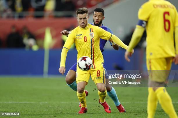 Mihai Pintilii of Romania, Tonny Vilhena of Holland, Vlad Chiriches of Romania during the friendly match between Romania and The Netherlands on...