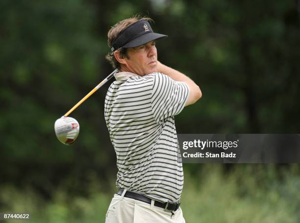 Actor Dennis Quaid hits a drive during the third round of the BMW Charity Pro-Am at Thornblade Club held on May 16, 2009 in Greer, South Carolina.