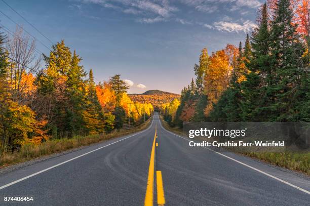 the road to greenville maine - maine road stock pictures, royalty-free photos & images