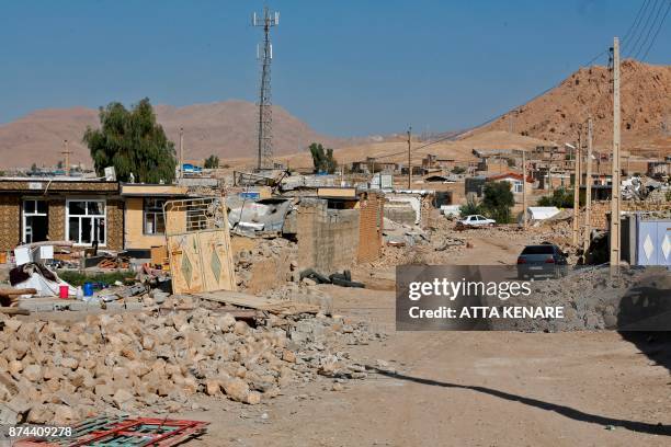 Picture taken on November 15, 2017 shows destroyed buildings in Kouik village near to Sarpol-e Zahab, two days after a 7.3-magnitude earthquake...