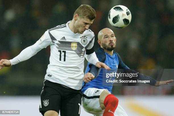 Timo Werner of Germany, Christophe Jallet of France during the International Friendly match between Germany v France at the RheinEnergie Stadium on...