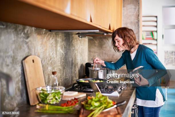 this smells so delicious - making dinner stock pictures, royalty-free photos & images