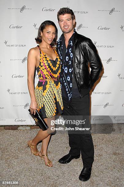 Actress Paula Patton and musician Robin Thicke arrives at The Art of Elysium's first annual PARADIS with Cartier and Relativity Media at the Soho...