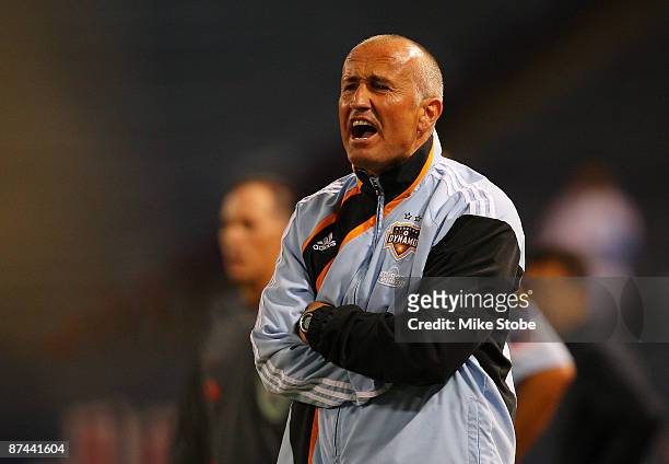 Head Coach Dominic Kinnear of the Houston Dynamo reacts from the bench against the New York Red Bulls at Giants Stadium in the Meadowlands on May 16,...